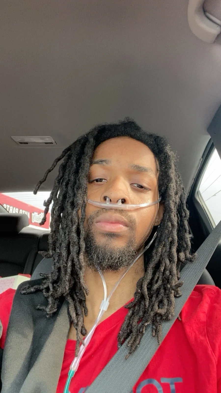Jerry Fort taking a selfie in a car.